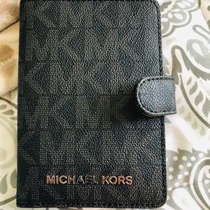 MK passport wallet black and gold